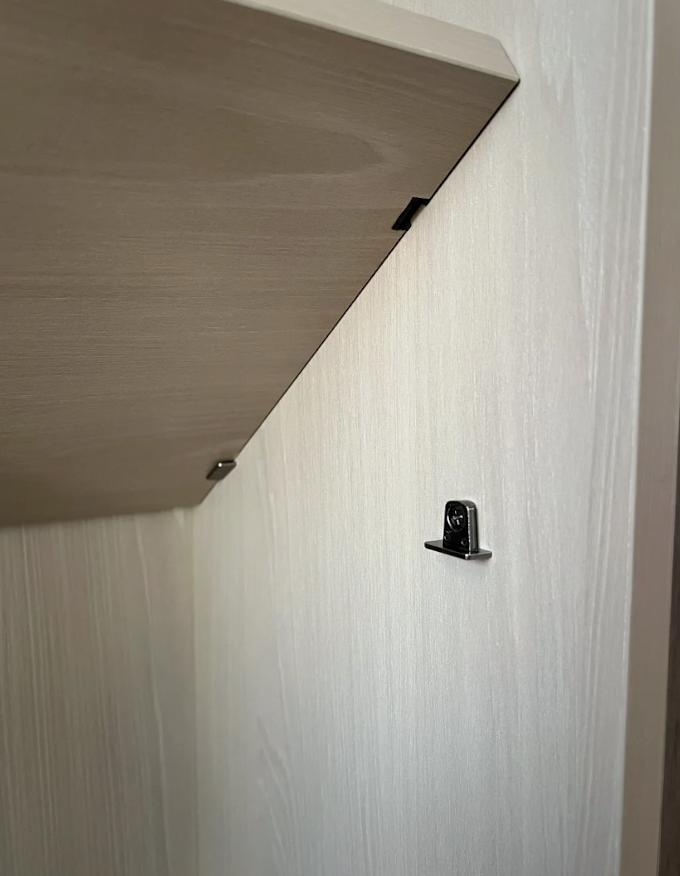 Removable base panel on brackets